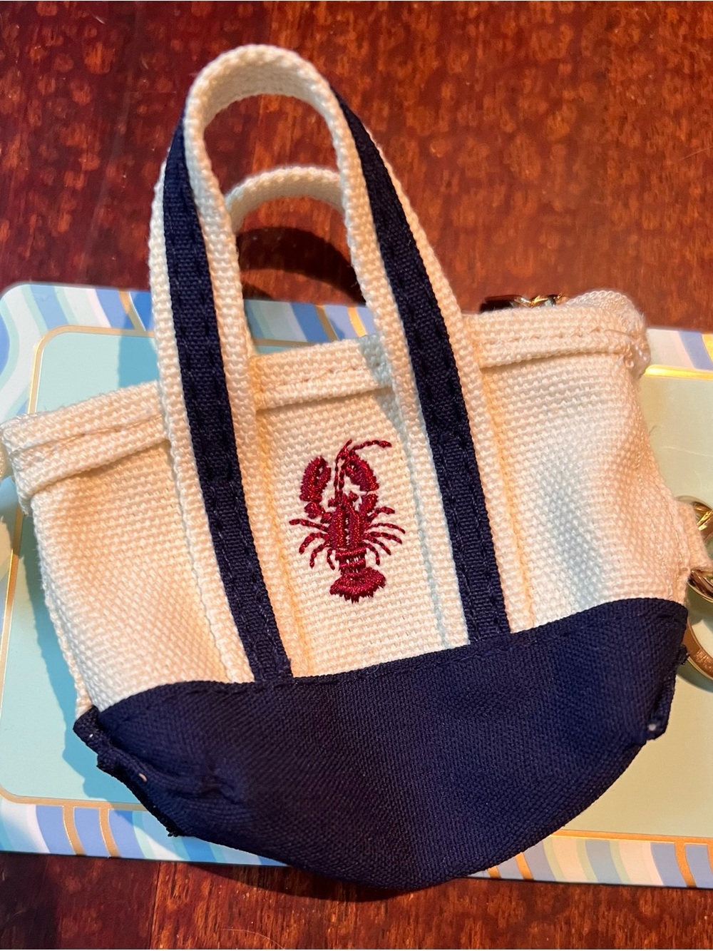 Piper K Canvas Mini Tote Bag Charm in Cream & Navy with Embroidered Red Lobster